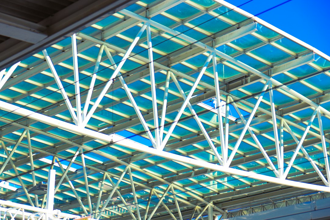 Services a-metal-structure-with-a-blue-sky-in-the-background-iqbku80dpbg